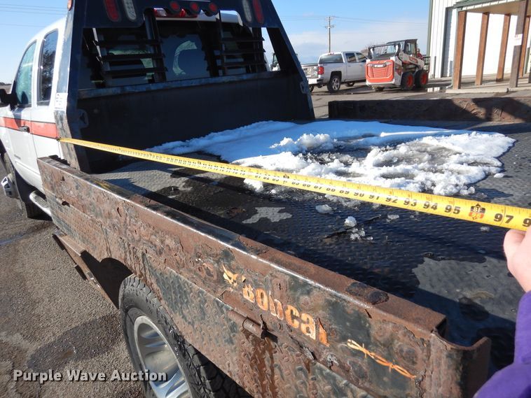 image for item DR1132 2012 GMC Sierra 3500HD  Ext. Cab flatbed pickup truck