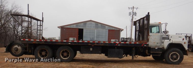 image for item IM9627 1992 Mack DM690S  flatbed truck