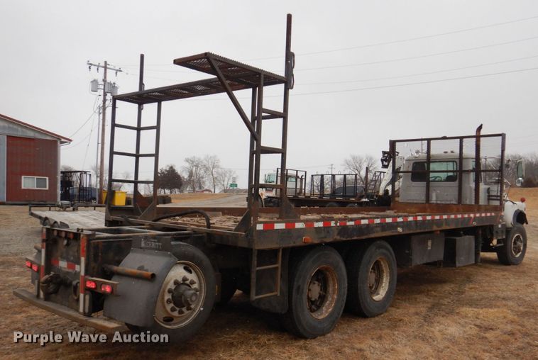 image for item IM9627 1992 Mack DM690S  flatbed truck