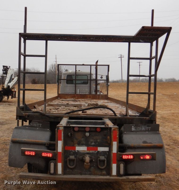 image for item IM9627 1992 Mack DM690S  flatbed truck