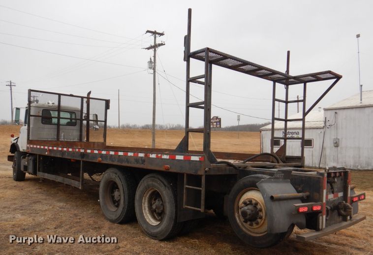 image for item IM9627 1992 Mack DM690S  flatbed truck