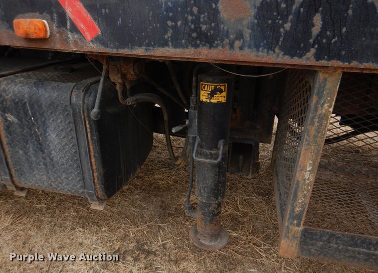 image for item IM9627 1992 Mack DM690S  flatbed truck