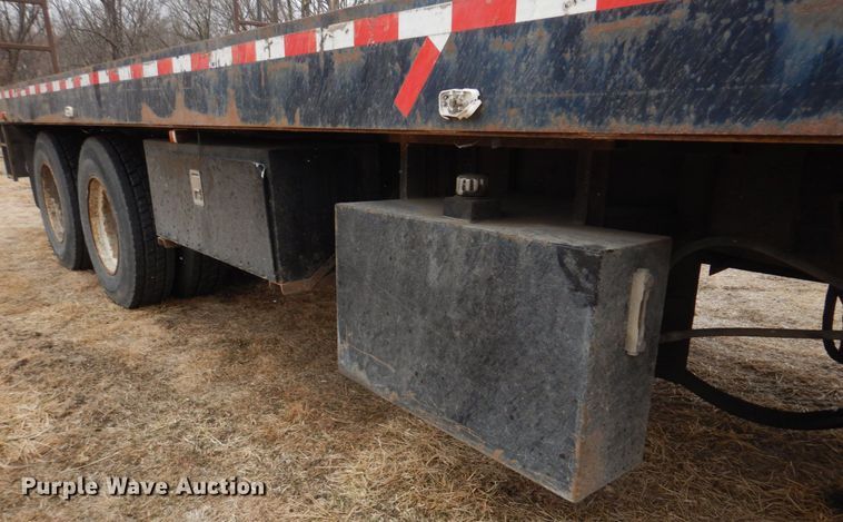 image for item IM9627 1992 Mack DM690S  flatbed truck