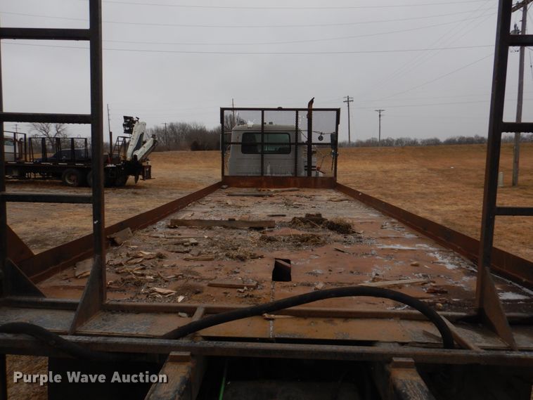 image for item IM9627 1992 Mack DM690S  flatbed truck