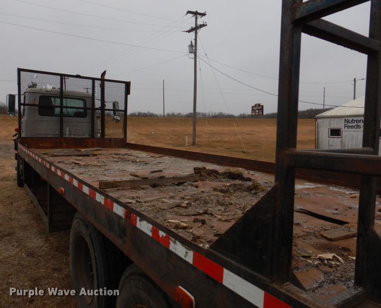 image for item IM9627 1992 Mack DM690S  flatbed truck