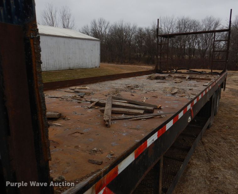 image for item IM9627 1992 Mack DM690S  flatbed truck