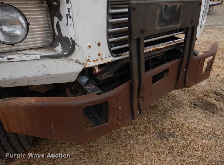 image for item IM9627 1992 Mack DM690S  flatbed truck