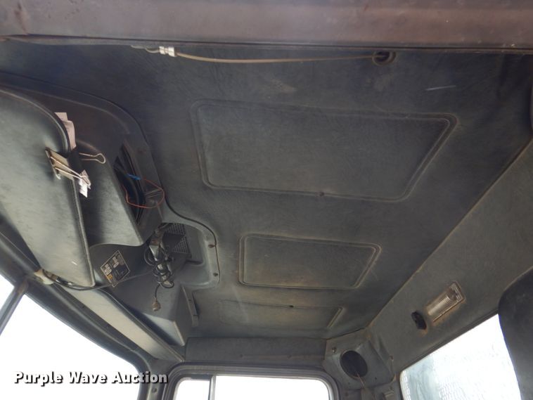 image for item IM9627 1992 Mack DM690S  flatbed truck