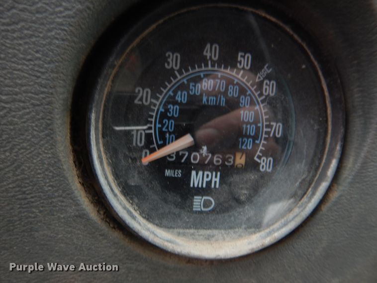 image for item IM9627 1992 Mack DM690S  flatbed truck