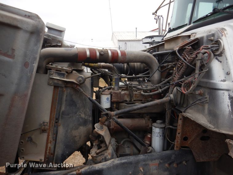 image for item IM9627 1992 Mack DM690S  flatbed truck