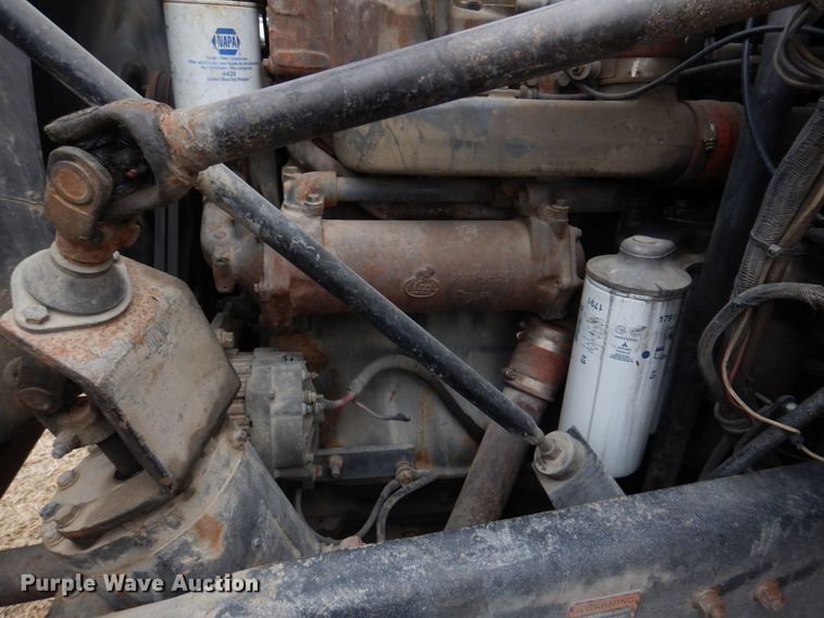 image for item IM9627 1992 Mack DM690S  flatbed truck