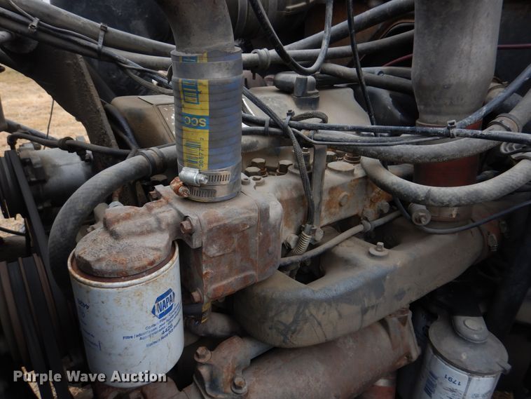 image for item IM9627 1992 Mack DM690S  flatbed truck