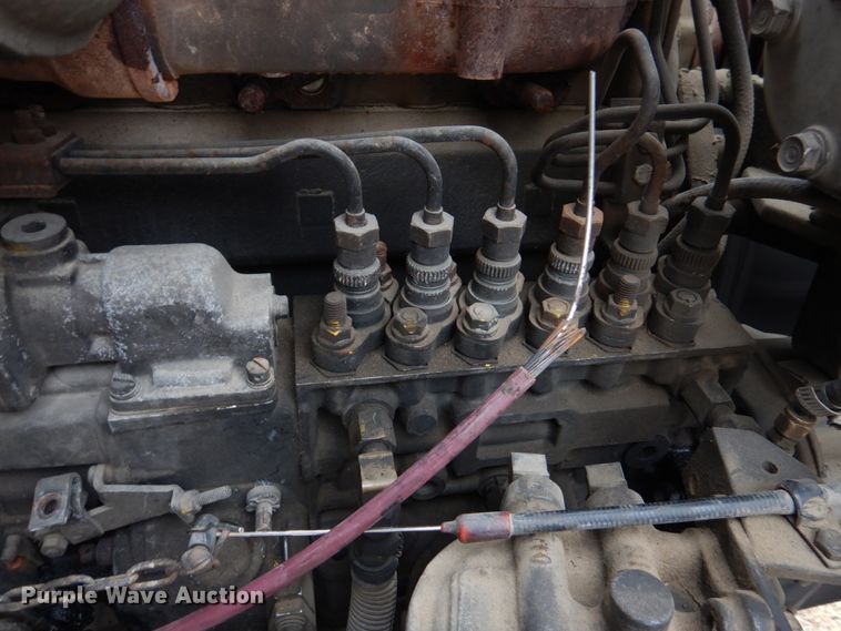 image for item IM9627 1992 Mack DM690S  flatbed truck