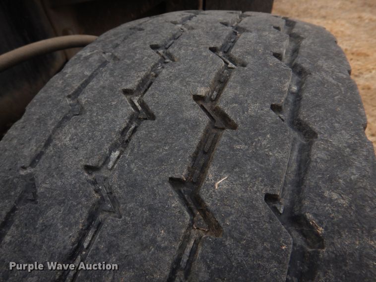 image for item IM9627 1992 Mack DM690S  flatbed truck