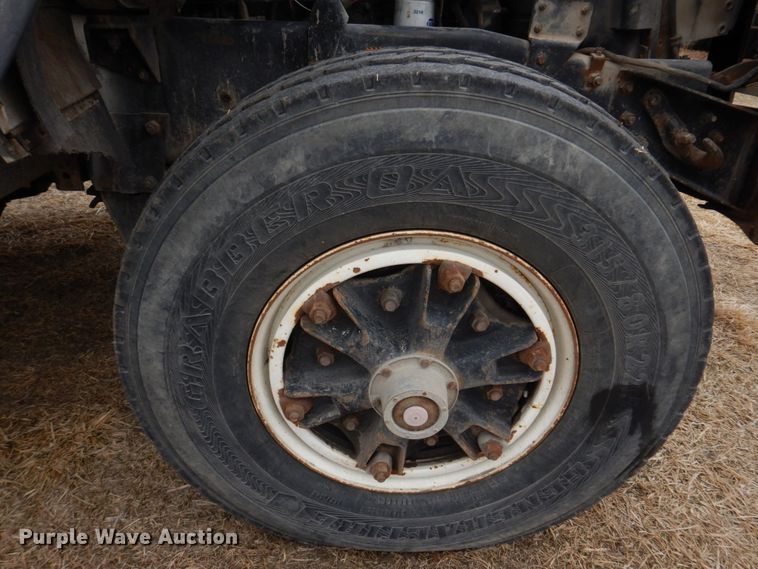 image for item IM9627 1992 Mack DM690S  flatbed truck