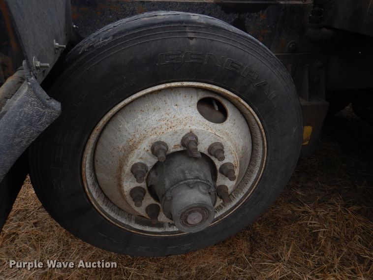 image for item IM9627 1992 Mack DM690S  flatbed truck