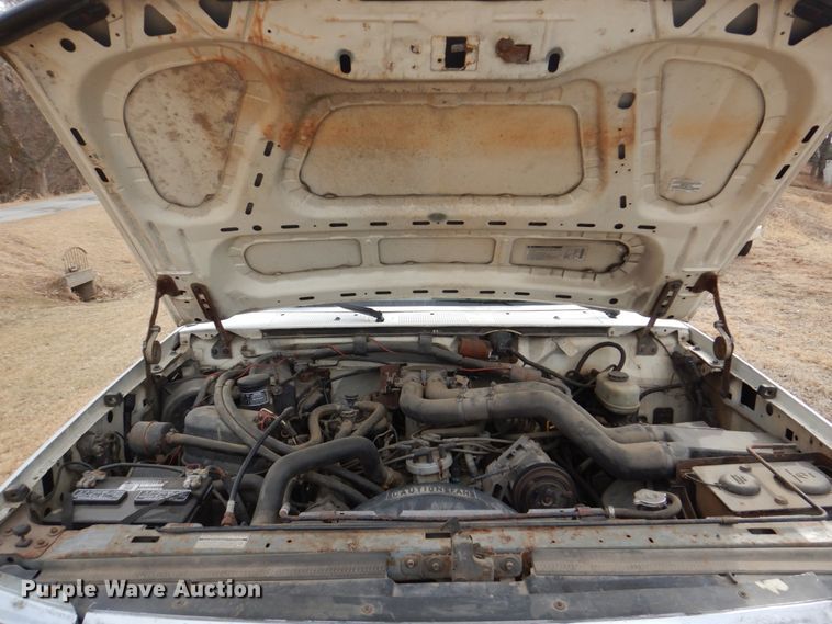 image for item JJ9307 1993 Ford F450 Super Duty  flatbed truck