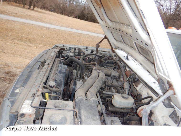 image for item JJ9307 1993 Ford F450 Super Duty  flatbed truck