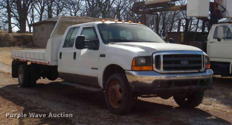 image for item JJ9308 2000 Ford F550 Super Duty XLT  flatbed truck