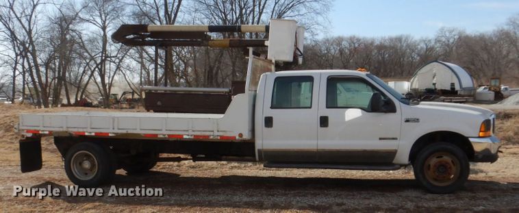 image for item JJ9308 2000 Ford F550 Super Duty XLT  flatbed truck