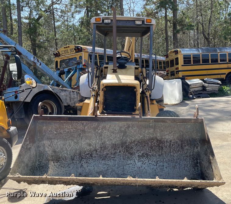 image for item DI8636 New Holland 555E  backhoe