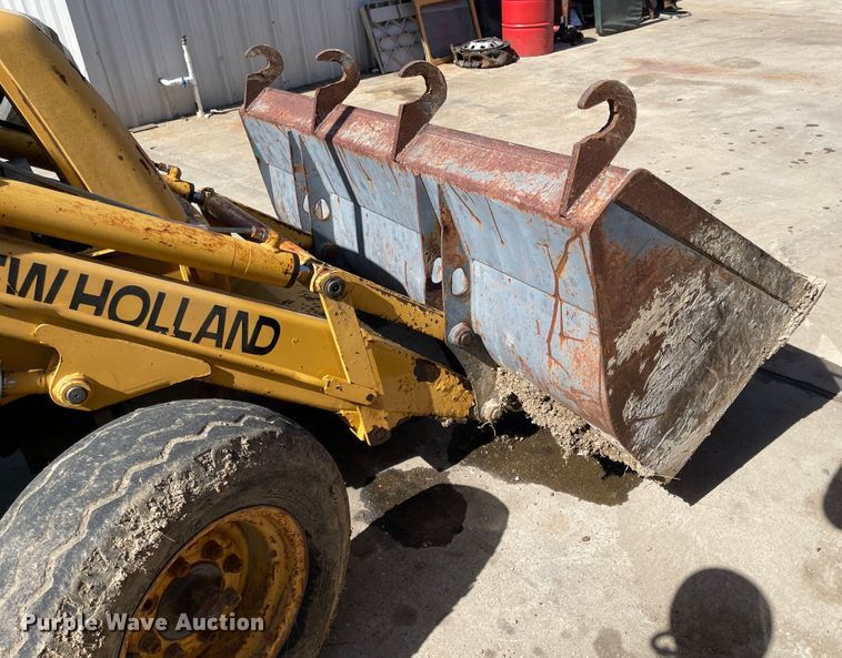 image for item DI8636 New Holland 555E  backhoe