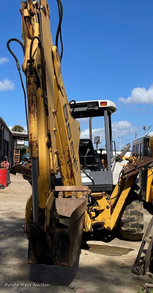 image for item DI8636 New Holland 555E  backhoe