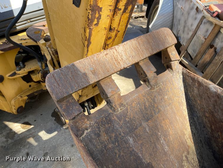 image for item DI8636 New Holland 555E  backhoe