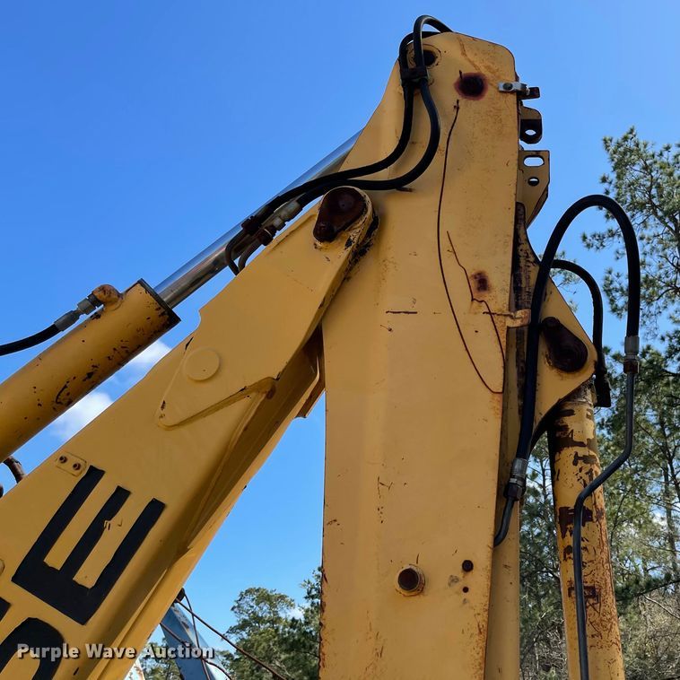 image for item DI8636 New Holland 555E  backhoe