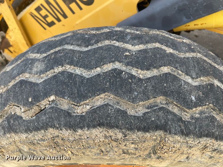 image for item DI8636 New Holland 555E  backhoe