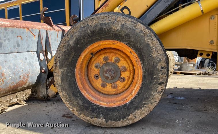 image for item DI8636 New Holland 555E  backhoe