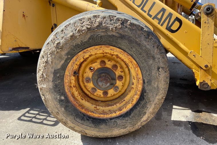 image for item DI8636 New Holland 555E  backhoe