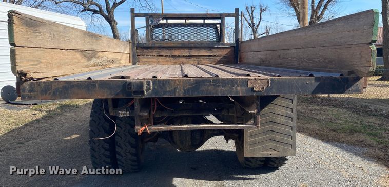 image for item IG9713 1984 Ford F800  dump flatbed truck