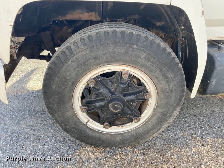 image for item IG9713 1984 Ford F800  dump flatbed truck