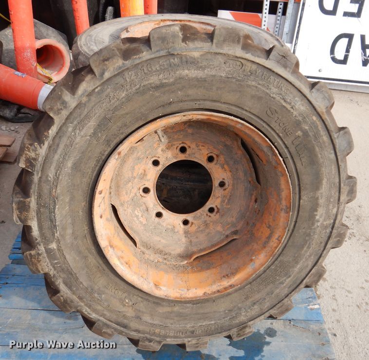 image for item JK9560 (3) 12-16.5 tires and wheels