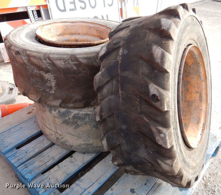 image for item JK9560 (3) 12-16.5 tires and wheels