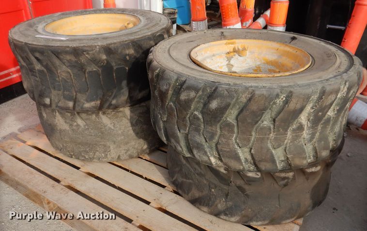 image for item JK9561 (4) 12-16.5NHS tires and wheels