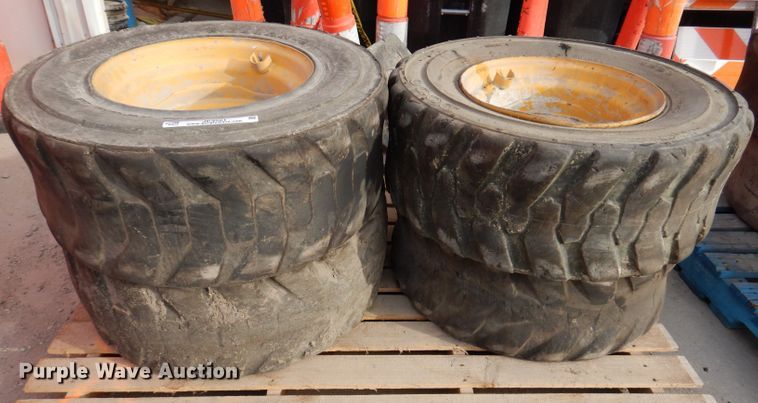 image for item JK9561 (4) 12-16.5NHS tires and wheels