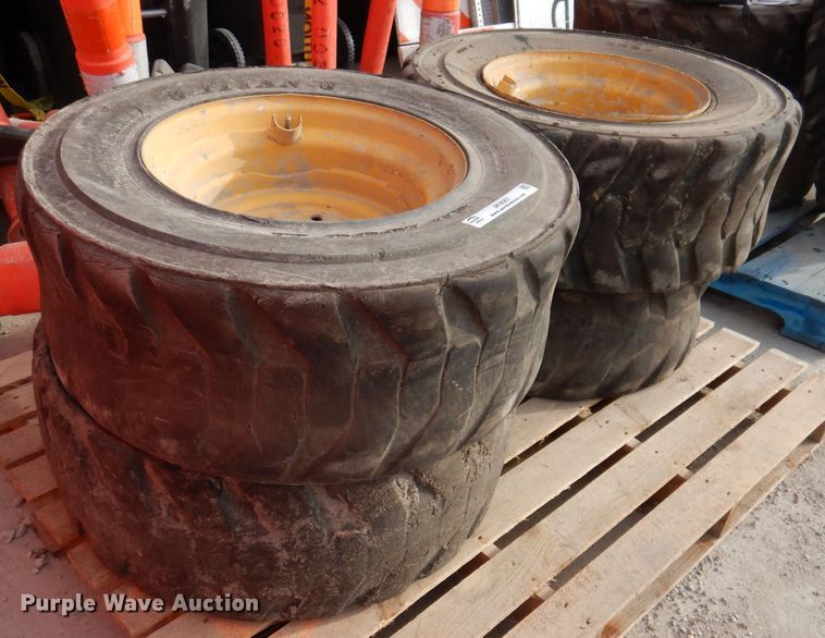 image for item JK9561 (4) 12-16.5NHS tires and wheels