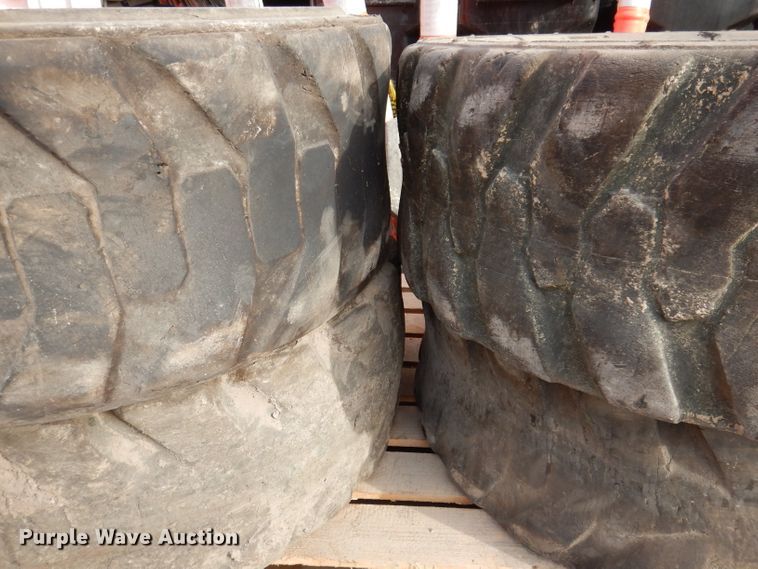 image for item JK9561 (4) 12-16.5NHS tires and wheels