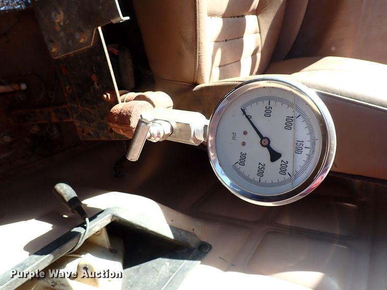 image for item JO9702 2003 Mack CV713  vacuum truck