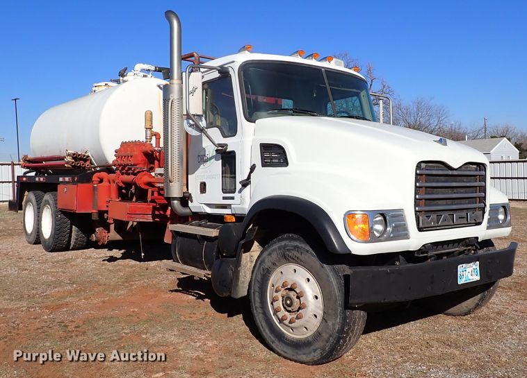 image for item JO9703 2003 Mack CV713  vacuum truck