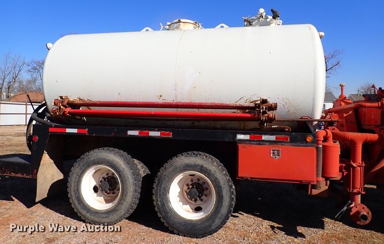 image for item JO9703 2003 Mack CV713  vacuum truck