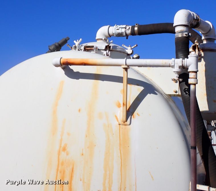 image for item JO9703 2003 Mack CV713  vacuum truck