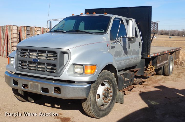 image for item MX9817 2000 Ford F650  Crew Cab flatbed truck
