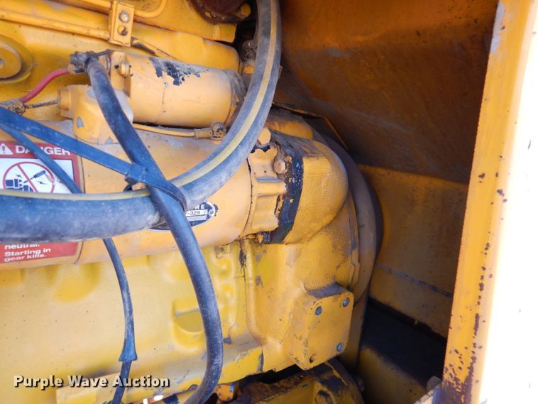 image for item DN1329 1981 John Deere 570A  motor grader