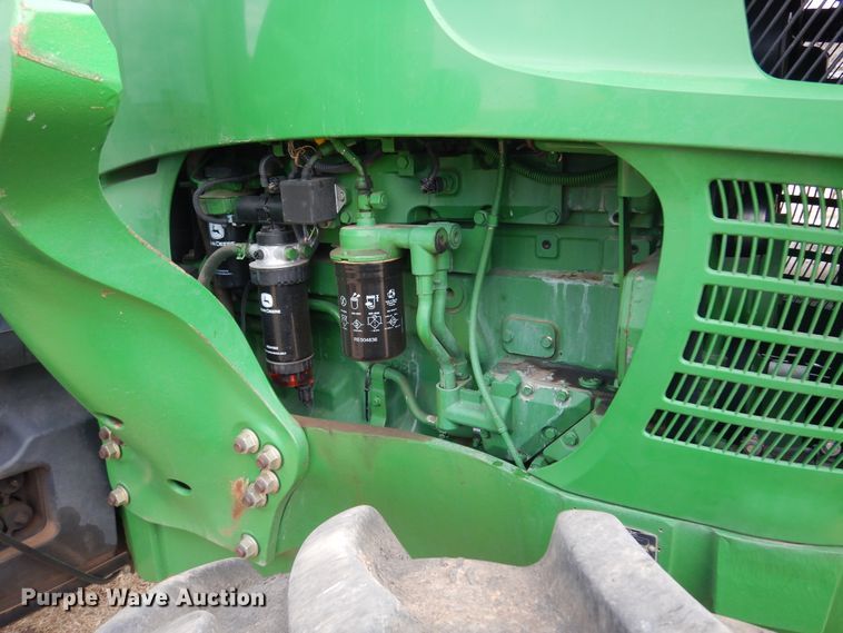 image for item DM1035 2010 John Deere 7730  MFWD tractor