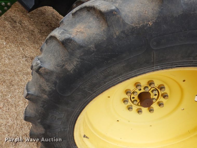 image for item DM1035 2010 John Deere 7730  MFWD tractor