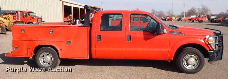 image for item DI1794 2011 Ford F250 Super Duty  Crew Cab utility bed pickup truck