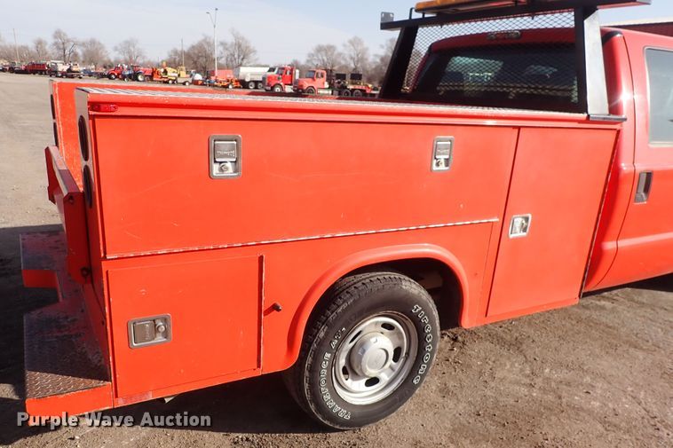 image for item DI1795 2011 Ford F250 Super Duty  Crew Cab utility bed pickup truck